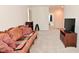 Upstairs living room with carpeting and a comfortable couch at 1351 Byron St, Greenfield, IN 46140