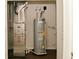 Mechanical closet featuring a furnace and water heater at 1351 Byron St, Greenfield, IN 46140