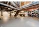 Spacious unfinished basement with open ceiling, concrete flooring, stairs, and ample room for storage or recreation at 16714 Oak Rd, Westfield, IN 46074