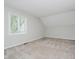 Bright and spacious bedroom with window view and neutral decor, perfect for relaxation at 16714 Oak Rd, Westfield, IN 46074