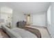 Spacious bedroom boasting a walk-in closet, ensuite bathroom, and neutral color scheme at 16714 Oak Rd, Westfield, IN 46074