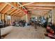 Unfinished shed featuring exposed timber framing with OSB walls, concrete floors, and ample space for storage and tools at 16714 Oak Rd, Westfield, IN 46074