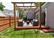 Backyard deck featuring seating and pergola at 1702 Kessler Blvd E Dr, Indianapolis, IN 46220