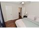 Charming bedroom boasts hardwood floors and neutral walls, creating a warm atmosphere at 1702 Kessler Blvd E Dr, Indianapolis, IN 46220
