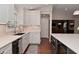 Modern kitchen with stainless steel appliances, sleek countertops, and a convenient island sink at 1702 Kessler Blvd E Dr, Indianapolis, IN 46220