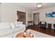 Living room with seating and view into the dining area at 1702 Kessler Blvd E Dr, Indianapolis, IN 46220