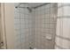 Shower stall with tiled walls and overhead shower head at 1702 Kessler Blvd E Dr, Indianapolis, IN 46220