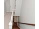 Staircase with carpet on top and hardwood on the bottom, enhanced by natural light at 1702 Kessler Blvd E Dr, Indianapolis, IN 46220
