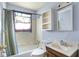Bathroom with a bathtub/shower combo, toilet, and a vanity sink at 1904 N Bosart Ave, Indianapolis, IN 46218