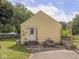 Exterior view of the home's backyard featuring a picnic table at 2018 N Rochester Ave, Indianapolis, IN 46222