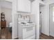 Functional kitchen area showcases modern appliances alongside vintage-style decor at 2018 N Rochester Ave, Indianapolis, IN 46222