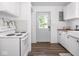 Well-lit kitchen featuring white appliances, cabinetry, and butcher block countertops at 2018 N Rochester Ave, Indianapolis, IN 46222