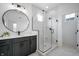 Bathroom featuring marble tile, glass shower, and modern vanity at 205 Poplar St, Westfield, IN 46074