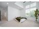 Spacious bedroom with high ceilings, large windows, and neutral carpet flooring at 205 Poplar St, Westfield, IN 46074
