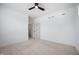 Empty bedroom with neutral carpet flooring and access to additional rooms at 205 Poplar St, Westfield, IN 46074