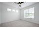 Bright bedroom with large windows and neutral carpet flooring at 205 Poplar St, Westfield, IN 46074
