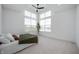 Bright bedroom with vaulted ceiling, large windows, and neutral carpet at 205 Poplar St, Westfield, IN 46074