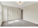 Bedroom with gray carpet, and a double door closet at 2074 Tompkins Dr, Westfield, IN 46074