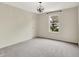 Bedroom with gray carpet, black light fixture, and natural light from the window at 2074 Tompkins Dr, Westfield, IN 46074