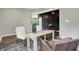 Cozy home office featuring a minimalist design with a light wood desk and elegant seating at 2074 Tompkins Dr, Westfield, IN 46074