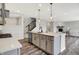 Open kitchen with large island and stainless dishwasher at 2074 Tompkins Dr, Westfield, IN 46074