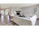 Bright living room features a stone fireplace and gray walls at 2074 Tompkins Dr, Westfield, IN 46074