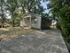 View of house with gray siding and stone driveway at 2127 Haines Ave, Indianapolis, IN 46221