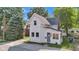 Charming two-story home with a welcoming front porch and blue door at 247 N 14Th St, Noblesville, IN 46060