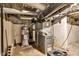 Basement with a Goodman furnace, water heater, and visible ductwork and pipes at 247 N 14Th St, Noblesville, IN 46060
