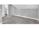 Bedroom featuring neutral walls, carpet, and doorway to a room with hardwood floors at 247 N 14Th St, Noblesville, IN 46060
