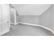 Neutral bedroom with gray walls and carpet, textured ceiling, and white door at 247 N 14Th St, Noblesville, IN 46060