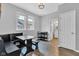 Bright dining area features a built-in corner table and plenty of natural light at 247 N 14Th St, Noblesville, IN 46060
