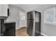 Kitchen includes a stainless steel refrigerator and stove at 247 N 14Th St, Noblesville, IN 46060