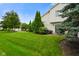 Well-manicured lawn and landscaping create a beautiful backyard oasis, perfect for outdoor enjoyment and entertaining at 255 Bastion Pl # Apt D, Avon, IN 46123