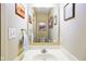 Well-lit bathroom with a vanity mirror and sink at 255 Bastion Pl # Apt D, Avon, IN 46123