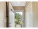 Bright entryway offers a view of the front yard and access to the living spaces and closet at 255 Bastion Pl # Apt D, Avon, IN 46123
