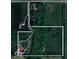 Aerial view of a large property featuring mature trees, a winding driveway, and a luxury home with a pool at 2825 E 216Th St, Cicero, IN 46034