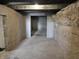 Unfinished basement space with block walls, showcasing potential for customized design at 2825 E 216Th St, Cicero, IN 46034