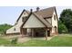 Exterior view highlighting the carport and garage, offering convenient parking and storage solutions at the home at 2825 E 216Th St, Cicero, IN 46034
