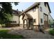 Charming exterior of home with stone accents and a covered entrance, nestled in a green yard at 2825 E 216Th St, Cicero, IN 46034