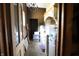 Hallway displaying neutral paint, chandelier, and adjacent cabinets, offering storage or display at 2825 E 216Th St, Cicero, IN 46034