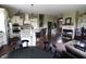 Spacious open concept living area with hardwood floors, fireplace, and natural light at 2825 E 216Th St, Cicero, IN 46034