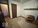 Bedroom featuring a neutral color scheme and door at , Shelbyville, IN 46176