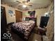 Cozy bedroom featuring a bed, closet, and fan at , Shelbyville, IN 46176