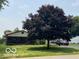 Charming home with a covered front porch and well-established landscaping at , Shelbyville, IN 46176