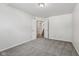Bedroom with carpet, and view into the stairwell at 3430 Whalen Ave, Indianapolis, IN 46227