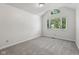 Bright bedroom with carpet, large windows, and vaulted ceiling at 3430 Whalen Ave, Indianapolis, IN 46227