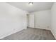 Clean bedroom featuring plush carpet, neutral walls, and a door to the hallway at 3430 Whalen Ave, Indianapolis, IN 46227