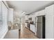 Bright kitchen with stainless steel appliances and sliding glass door to the backyard at 3430 Whalen Ave, Indianapolis, IN 46227