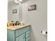 Charming powder room featuring a vanity with a granite countertop and modern fixtures at 3637 Newberry Rd, Plainfield, IN 46168